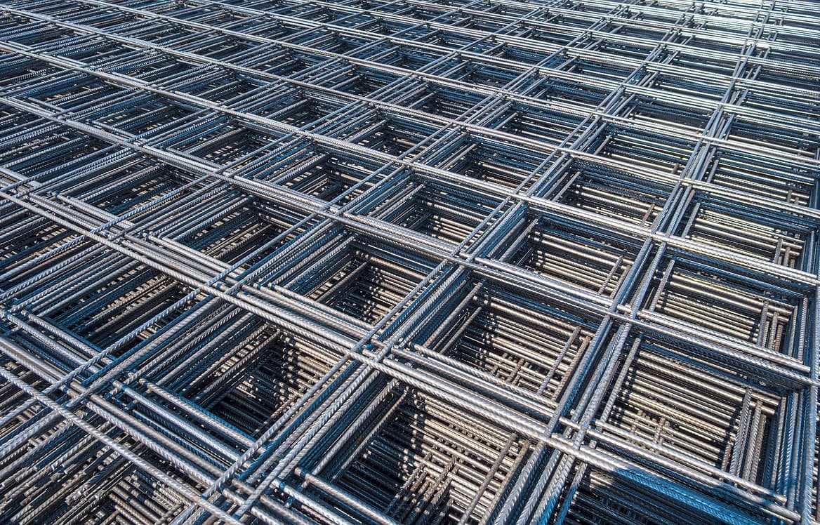 TMT bars tied into a column cage on site